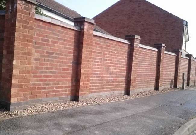 Garden Boundary wall built using london heather bricks at a job in Hempshall Vale Nottingham