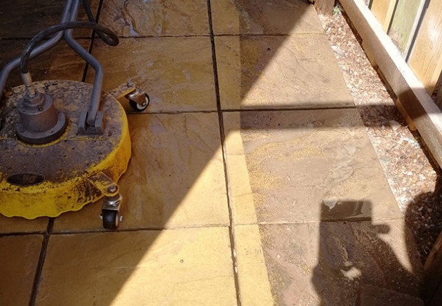 Patio raked out, cleaned and repointed in Arnold, Nottingham (during)