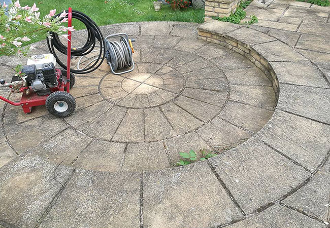 A Patio circle we repaired, cleaned and repointed on a job in Keyworth, Nottingham (before)