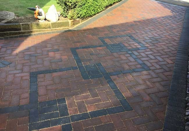 A concrete driveway we removed with groundwork prepared. A charcoal edging pavoir infill used with a brindle block paving on a job undertaken in Hucknall, Nottingham