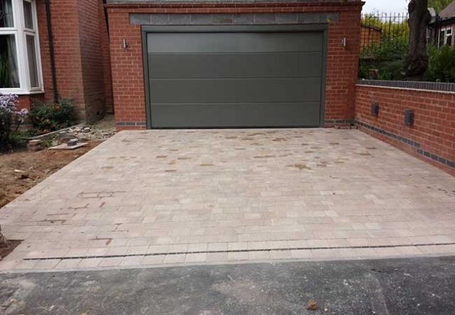 A driveway installed in front of a garage (that we also built) in Woodthorpe, Nottingham.