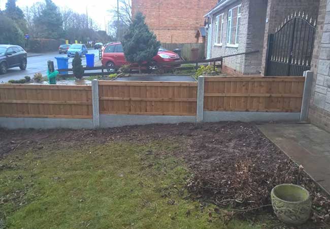 A fence we installed in Long Eaton, Nottingham using concrete post and gravel boards with close boarded panels for a job.