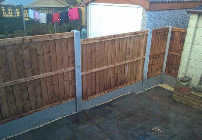 A fence we installed in Long Eaton, Nottingham using concrete post and gravel boards with close boarded panels for a job.
