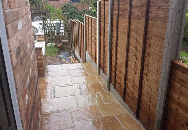 A patio we layed in Gedling, Nottingham once we had built the retaining wall, steps and installed the fence